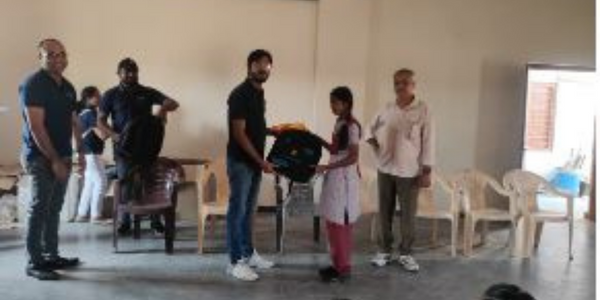 Bags and Stationary Distribution in ZPHS Gajularamaram at Malkajgiri District . Bags and Stationary Distribution in ZPHS Gajularamaram at Malkajgiri District .